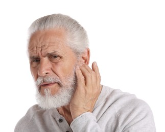 Photo of Senior man suffering from headache on white background