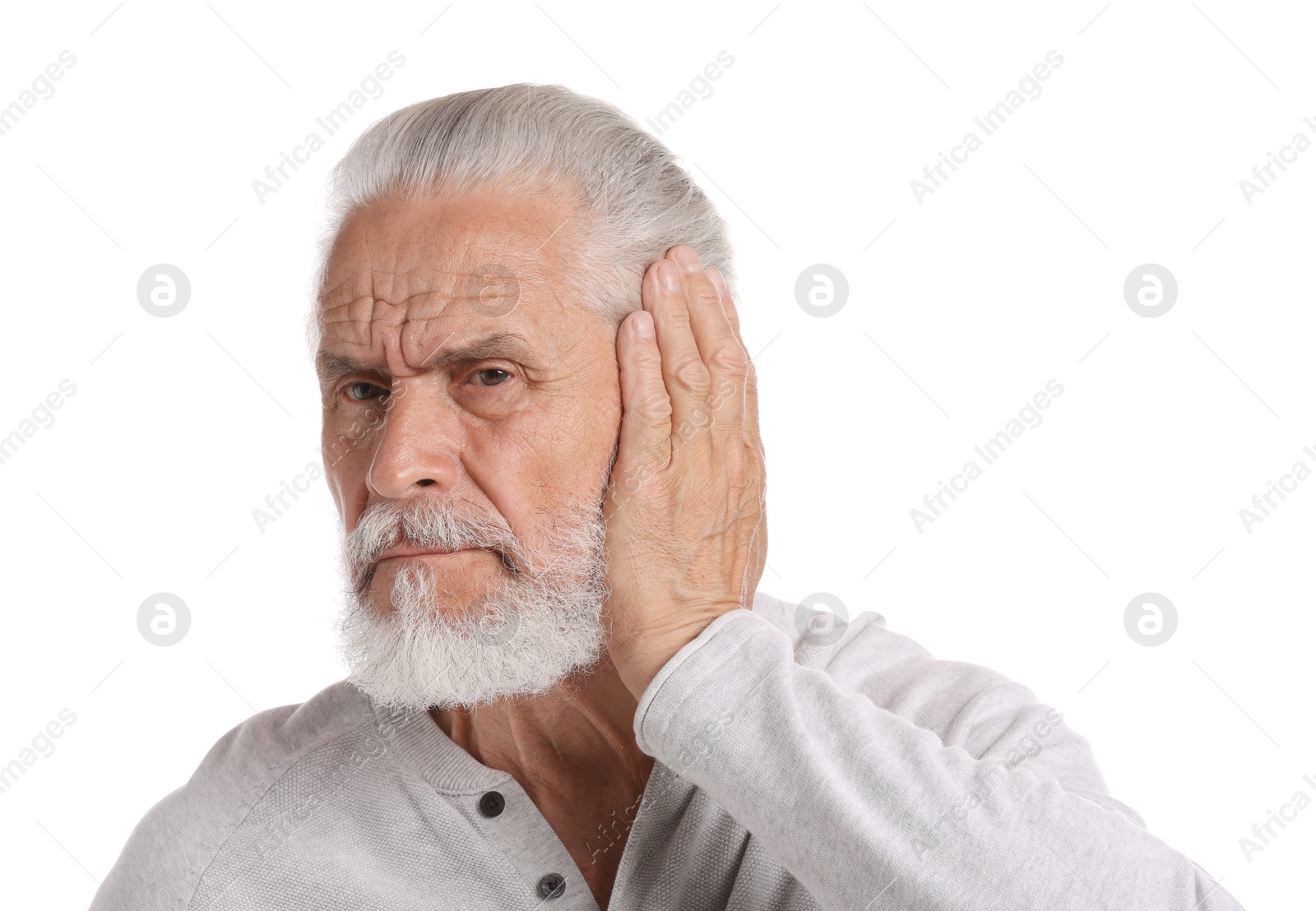 Senior man suffering from headache on white background Photo of Senior man suffering from headache on white background