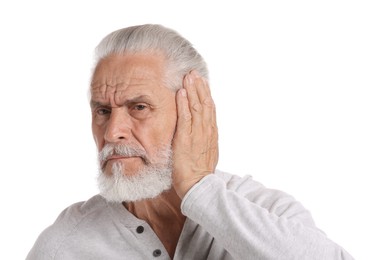 Photo of Senior man suffering from headache on white background