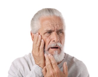 Photo of Senior man suffering from toothache on white background