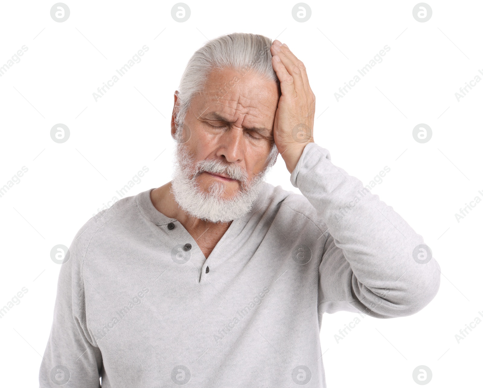 Photo of Senior man suffering from headache on white background