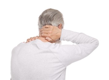 Photo of Senior man suffering from neck pain on white background, back view