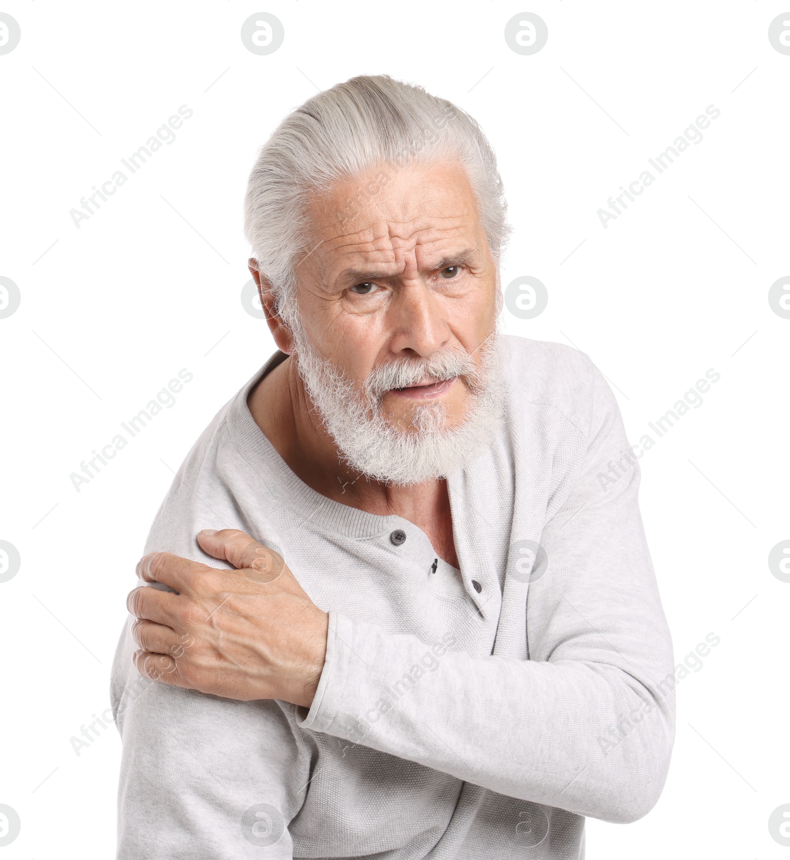 Photo of Senior man suffering from shoulder pain on white background