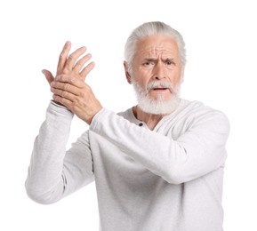 Photo of Senior man suffering from wrist pain on white background