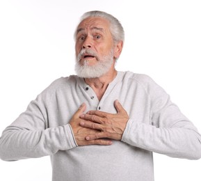 Photo of Senior man suffering from chest pain on white background