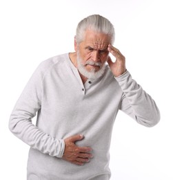 Photo of Senior man suffering from headache on white background