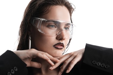 Photo of Beautiful young woman with black lip liner wearing glasses on white background, closeup