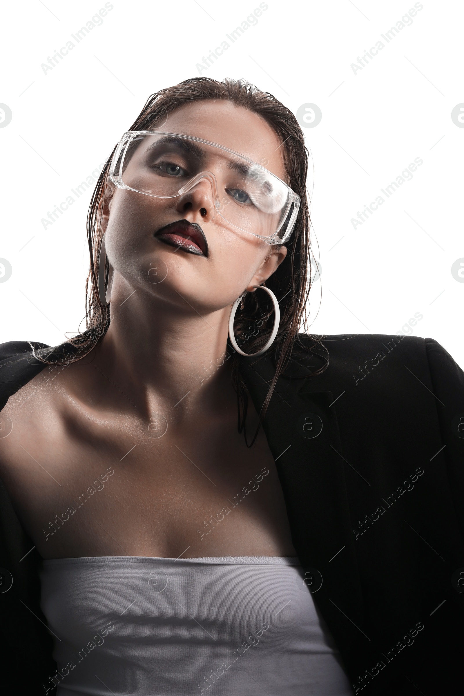 Photo of Beautiful young woman with black lip liner wearing glasses on white background