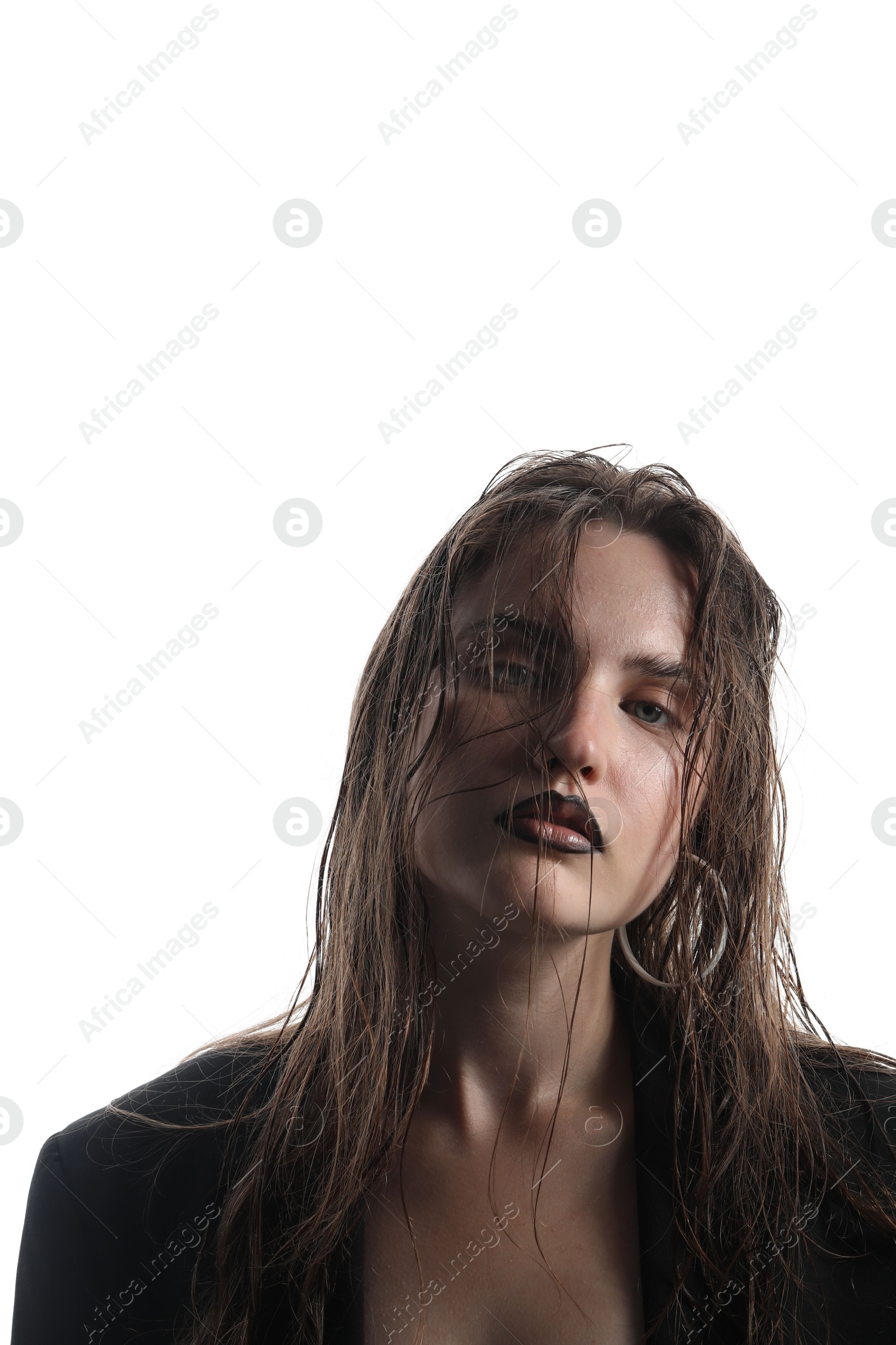 Beautiful young woman with black lip liner wearing stylish earrings on white background Photo of Beautiful young woman with black lip liner wearing stylish earrings on white background