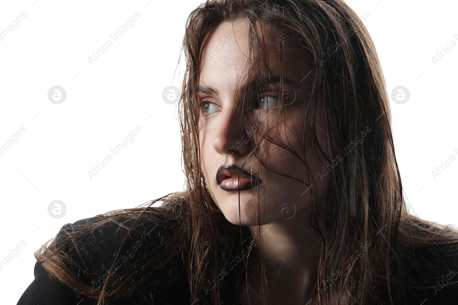 Beautiful young woman with black lip liner wearing stylish earrings on white background Photo of Beautiful young woman with black lip liner wearing stylish earrings on white background