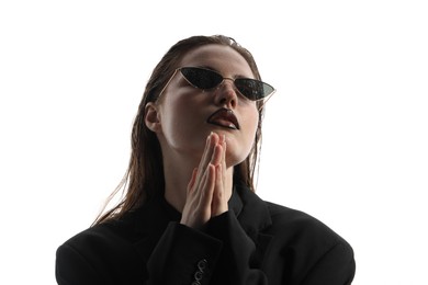 Photo of Beautiful young woman with black lip liner wearing wet sunglasses on white background