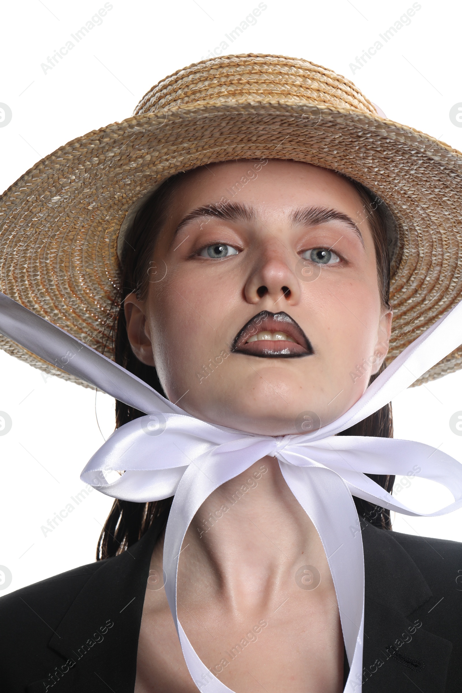 Beautiful young woman with black lip liner wearing straw hat on white background Photo of Beautiful young woman with black lip liner wearing straw hat on white background