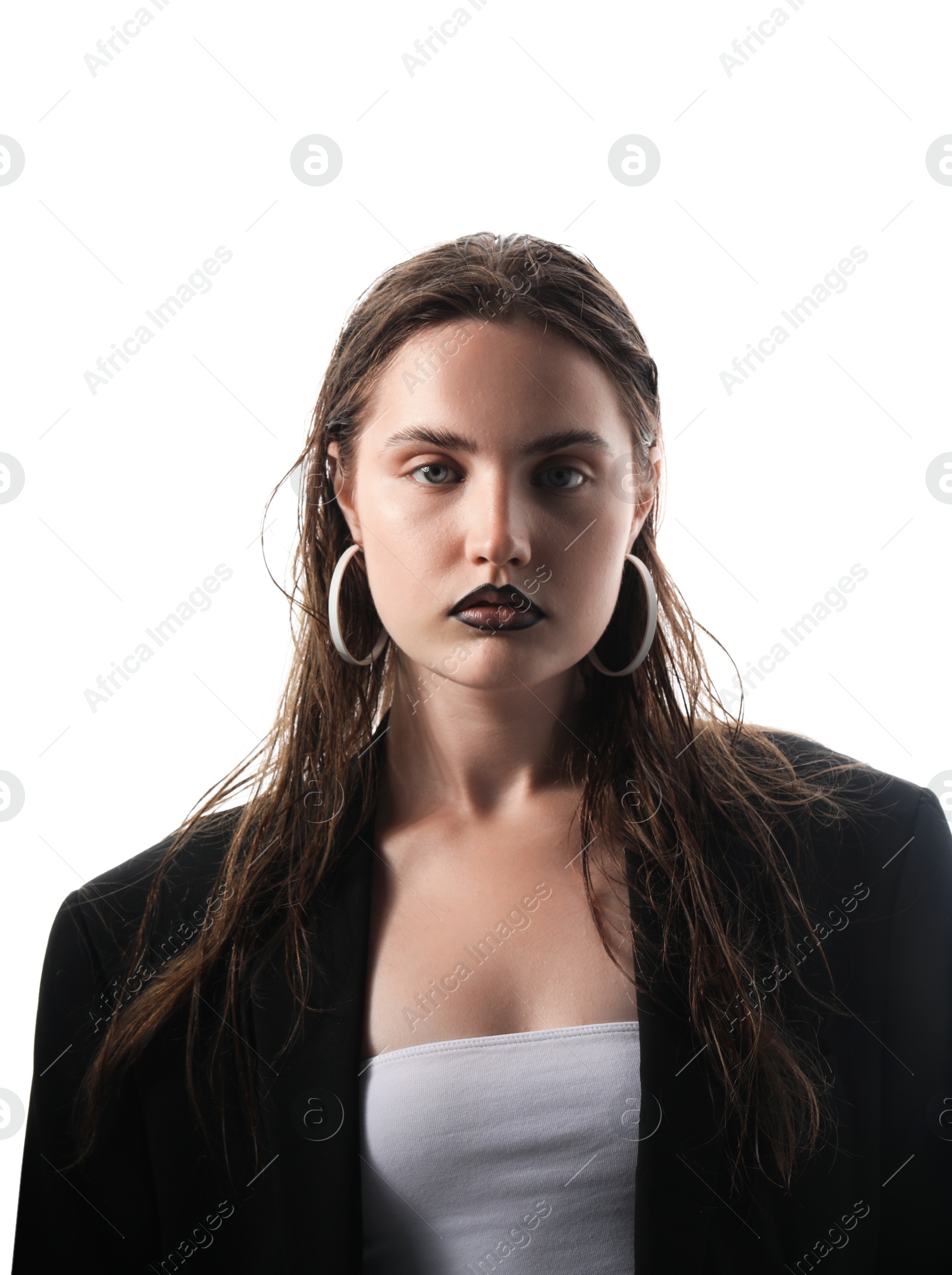 Beautiful young woman with black lip liner wearing stylish earrings on white background Photo of Beautiful young woman with black lip liner wearing stylish earrings on white background