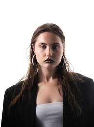 Photo of Beautiful young woman with black lip liner wearing stylish earrings on white background