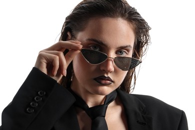 Photo of Beautiful young woman with black lip liner wearing wet sunglasses on white background