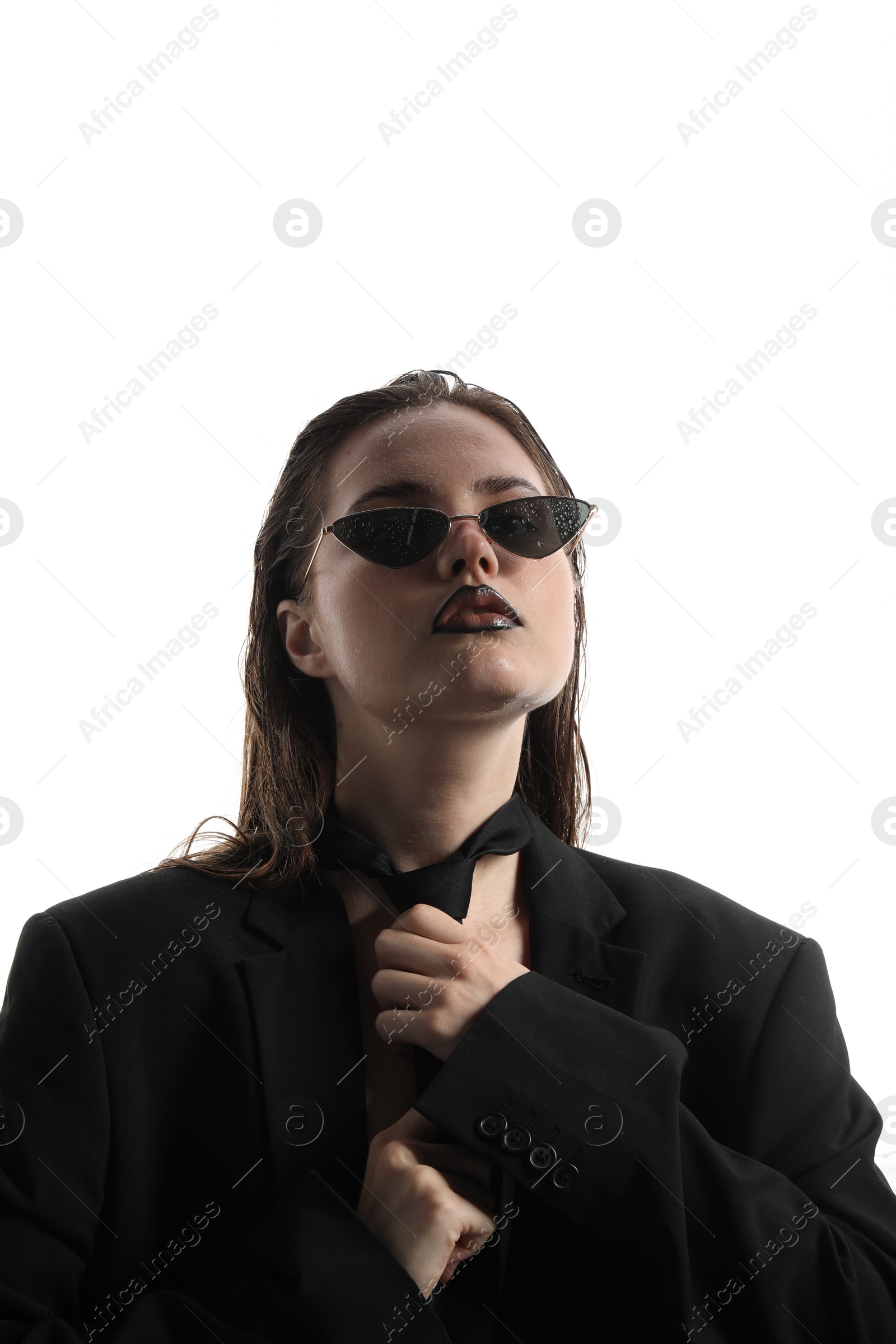 Beautiful young woman with black lip liner wearing wet sunglasses on white background Photo of Beautiful young woman with black lip liner wearing wet sunglasses on white background