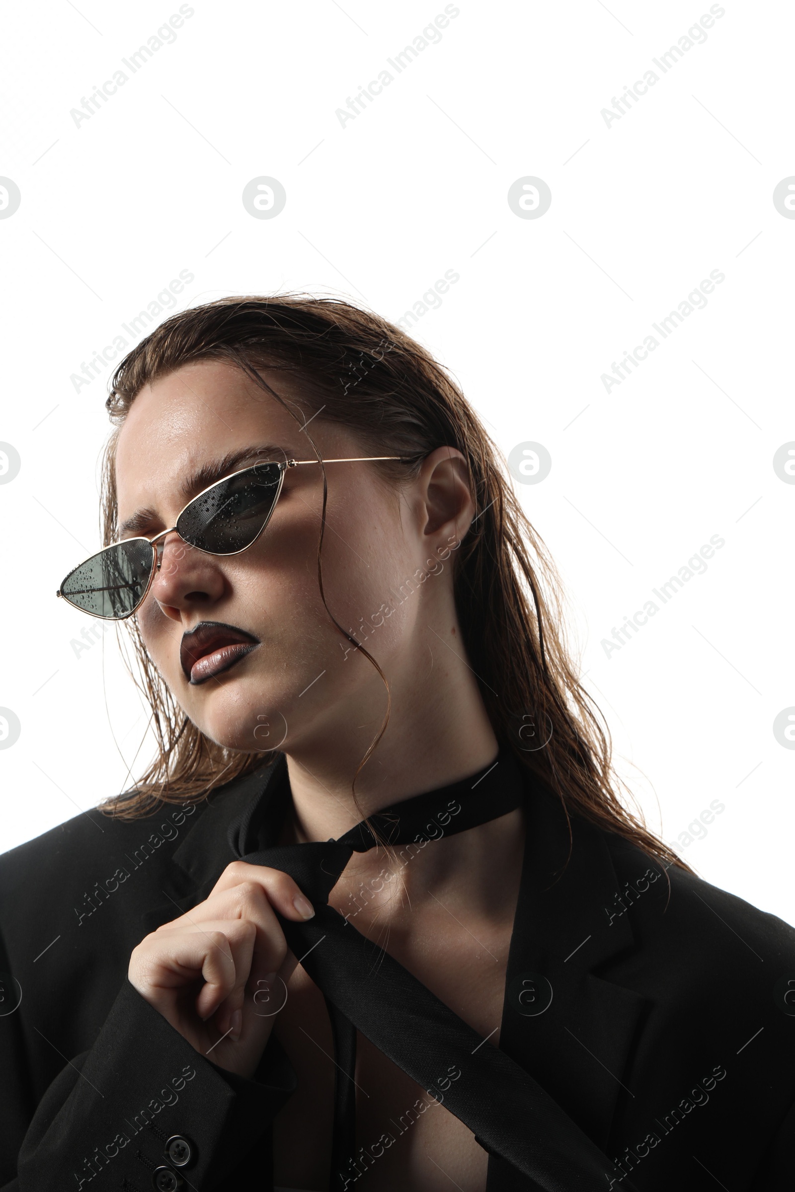 Beautiful young woman with black lip liner wearing wet sunglasses on white background Photo of Beautiful young woman with black lip liner wearing wet sunglasses on white background