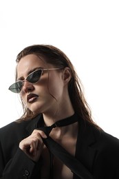 Photo of Beautiful young woman with black lip liner wearing wet sunglasses on white background