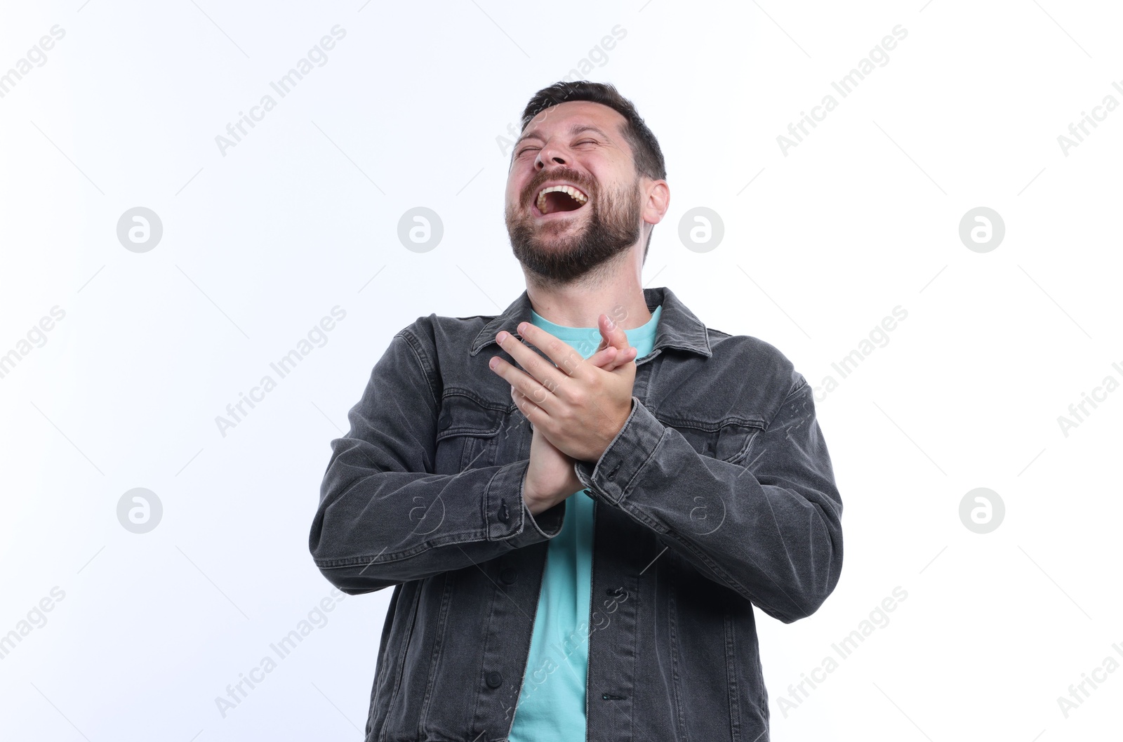Photo of Handsome man laughing on white background. Positive emotion