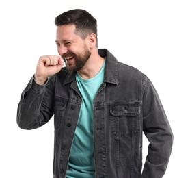 Photo of Handsome man laughing on white background. Positive emotion
