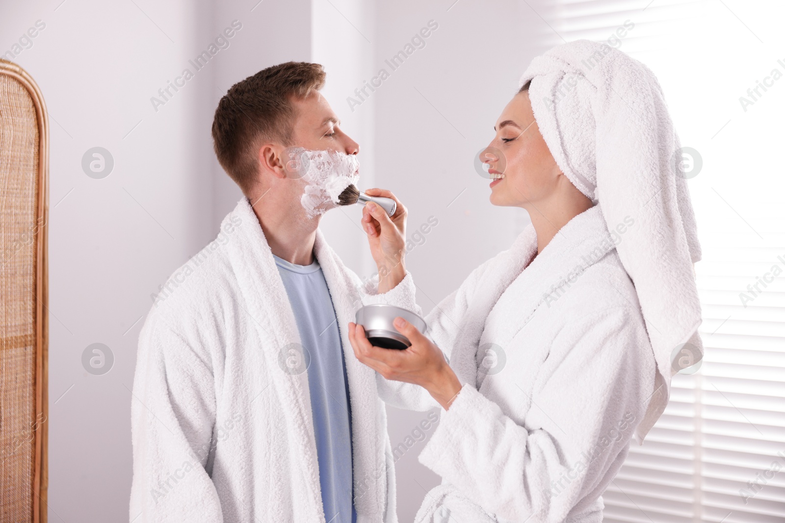 Young couple getting ready together at home Photo of Young couple getting ready together at home