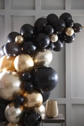 Photo of Stylish photo zone with balloons and decor in studio