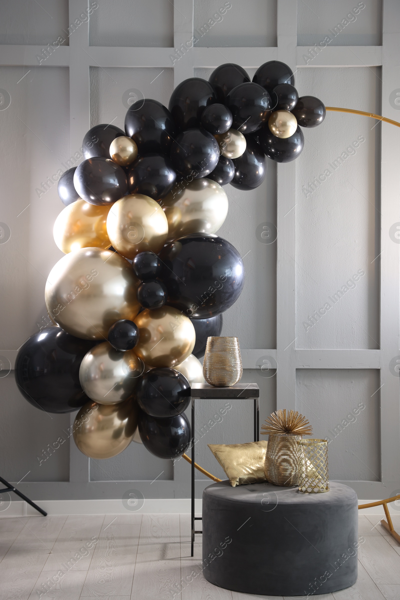 Photo of Stylish photo zone with balloons and decor in studio