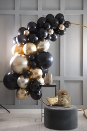 Photo of Stylish photo zone with balloons and decor in studio