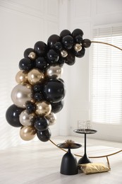 Photo of Stylish photo zone with balloons and decor in studio