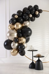 Photo of Stylish photo zone with balloons and decor in studio