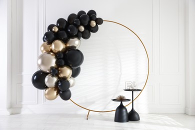 Photo of Stylish photo zone with balloons and decor in studio