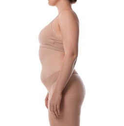 Photo of Woman in underwear on white background, closeup