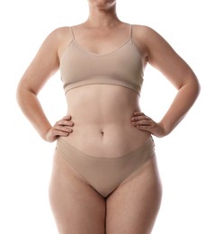 Photo of Woman in underwear on white background, closeup