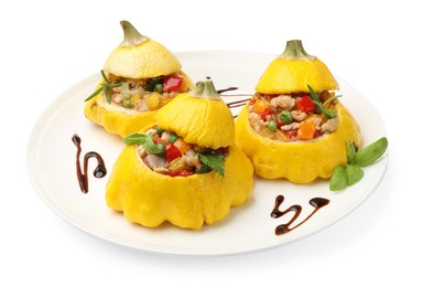Photo of Tasty stuffed pattypan squashes isolated on white