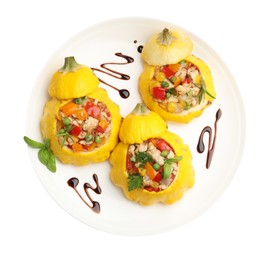 Photo of Tasty stuffed pattypan squashes isolated on white, top view