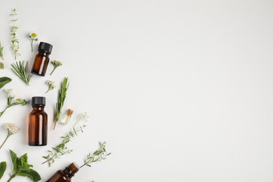 Photo of Essential oils and different plants on white background, flat lay. Space for text