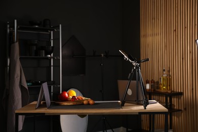Photo of Shooting vegetables with smartphone in studio. Professional food photography