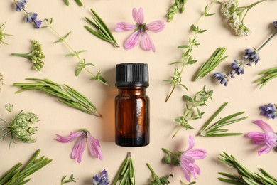 Photo of Essential oil and different plants on beige background, flat lay