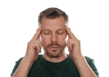 Photo of Panic attack. Man calming himself down on white background