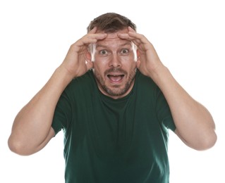 Photo of Man suffering from panic attack on white background