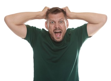 Photo of Man suffering from panic attack on white background