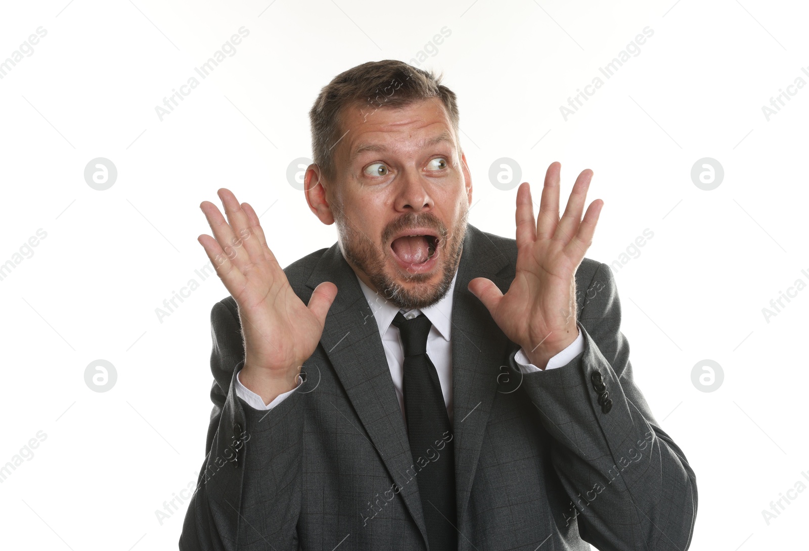 Photo of Businessman suffering from panic attack on white background
