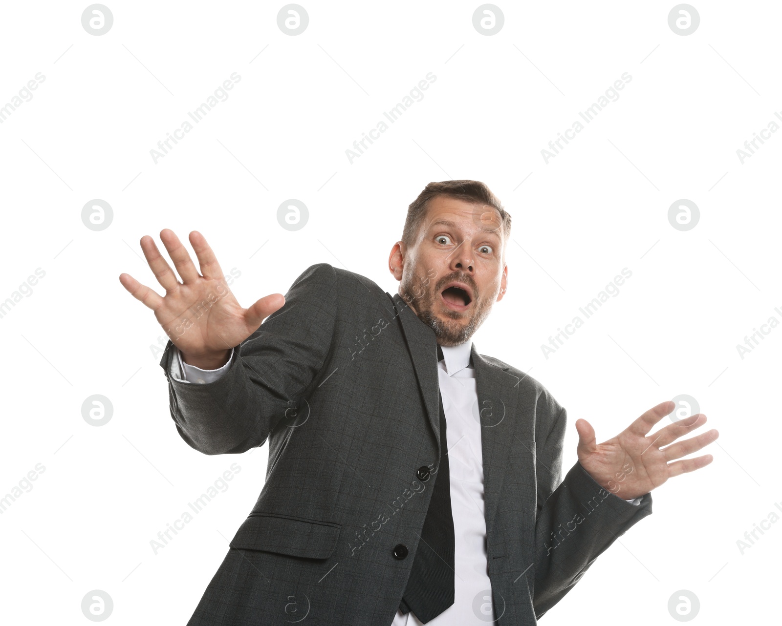 Businessman suffering from panic attack on white background Photo of Businessman suffering from panic attack on white background