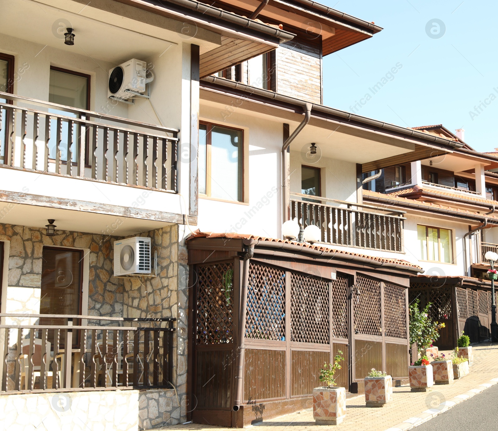 Sveti Vlas, Bulgaria - July 13, 2025: Beautiful residential building with balconies outdoors on sunny day Photo of Sveti Vlas, Bulgaria - July 13, 2025: Beautiful residential building with balconies outdoors on sunny day