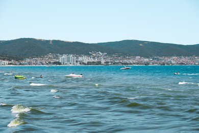 Photo of Picturesque seascape with mountains, coastline and boats