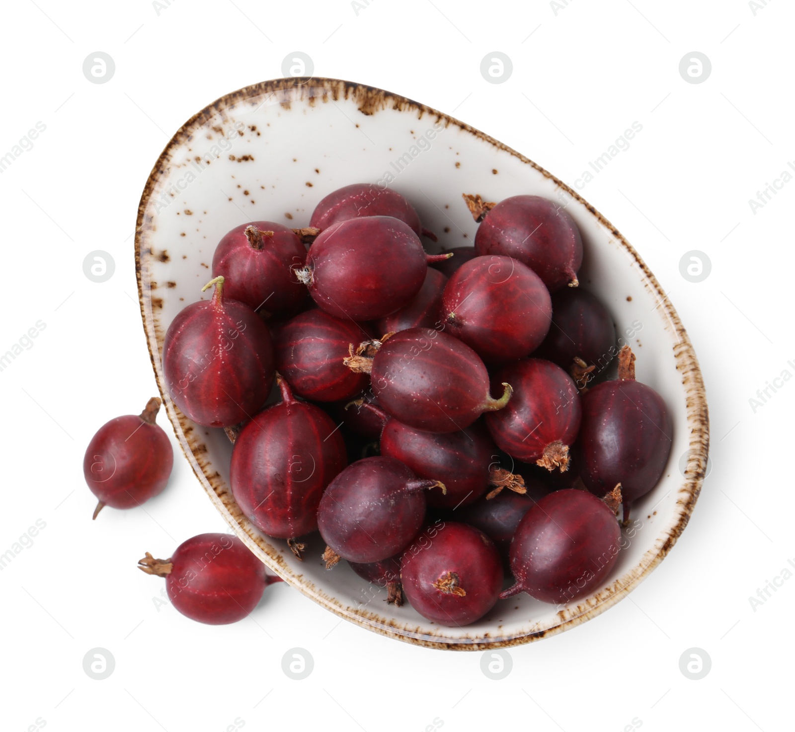 Fresh ripe red gooseberries in bowl isolated on white, top view Photo of Fresh ripe red gooseberries in bowl isolated on white, top view
