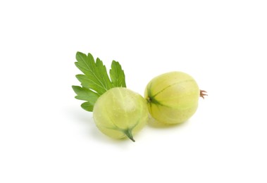 Photo of Fresh ripe green gooseberries with leaf isolated on white