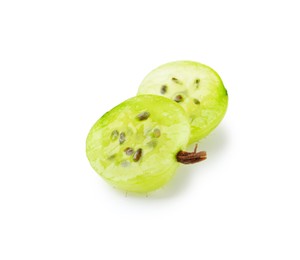 Photo of Halves of fresh ripe green gooseberry isolated on white