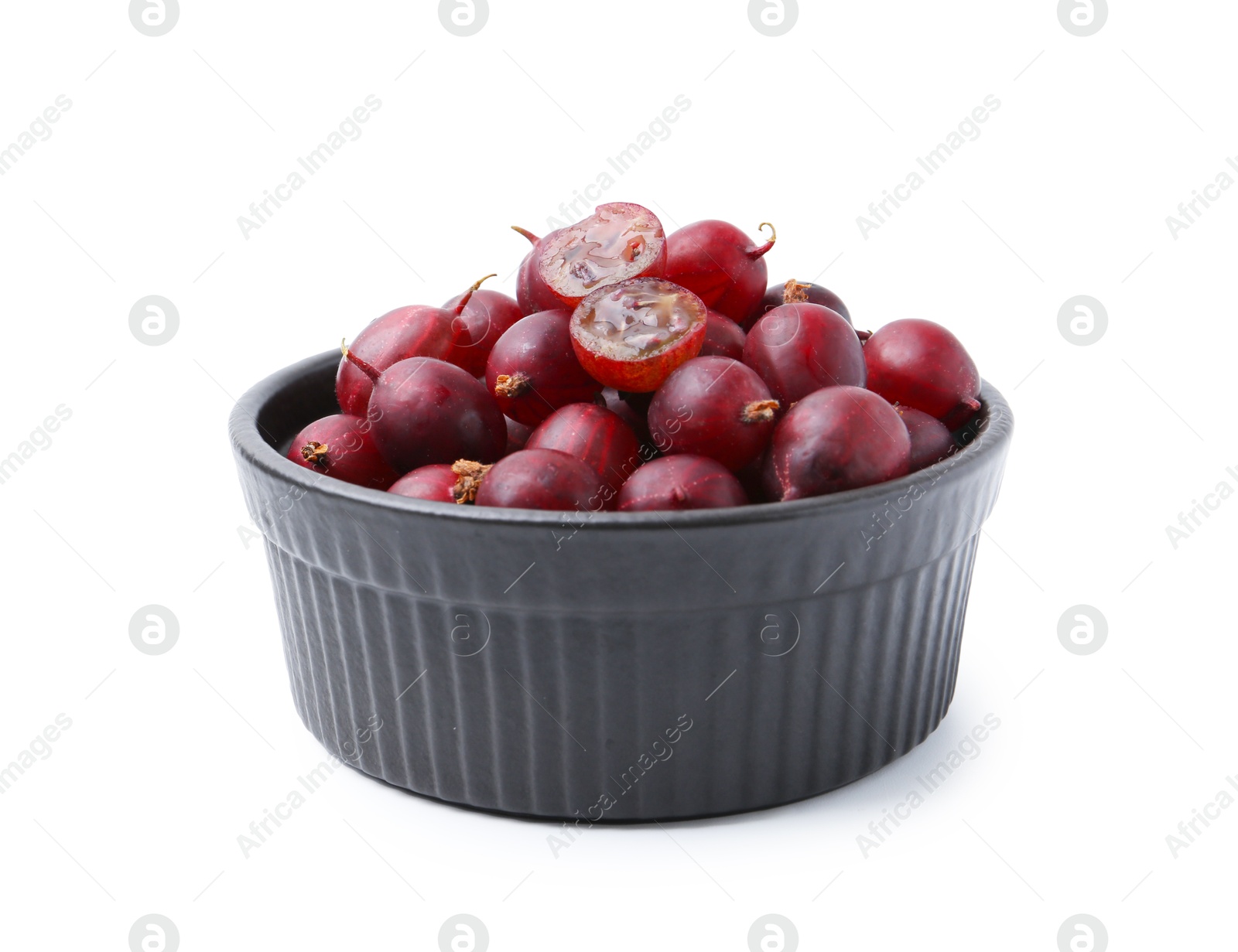 Fresh ripe red gooseberries in bowl isolated on white Photo of Fresh ripe red gooseberries in bowl isolated on white