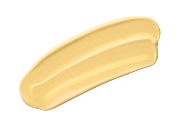 Image of Liquid makeup product in beige shade. Sample on white background, top view